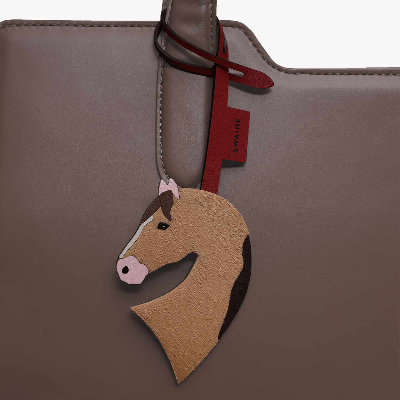 Horse Charm - Swaine Group Ltd