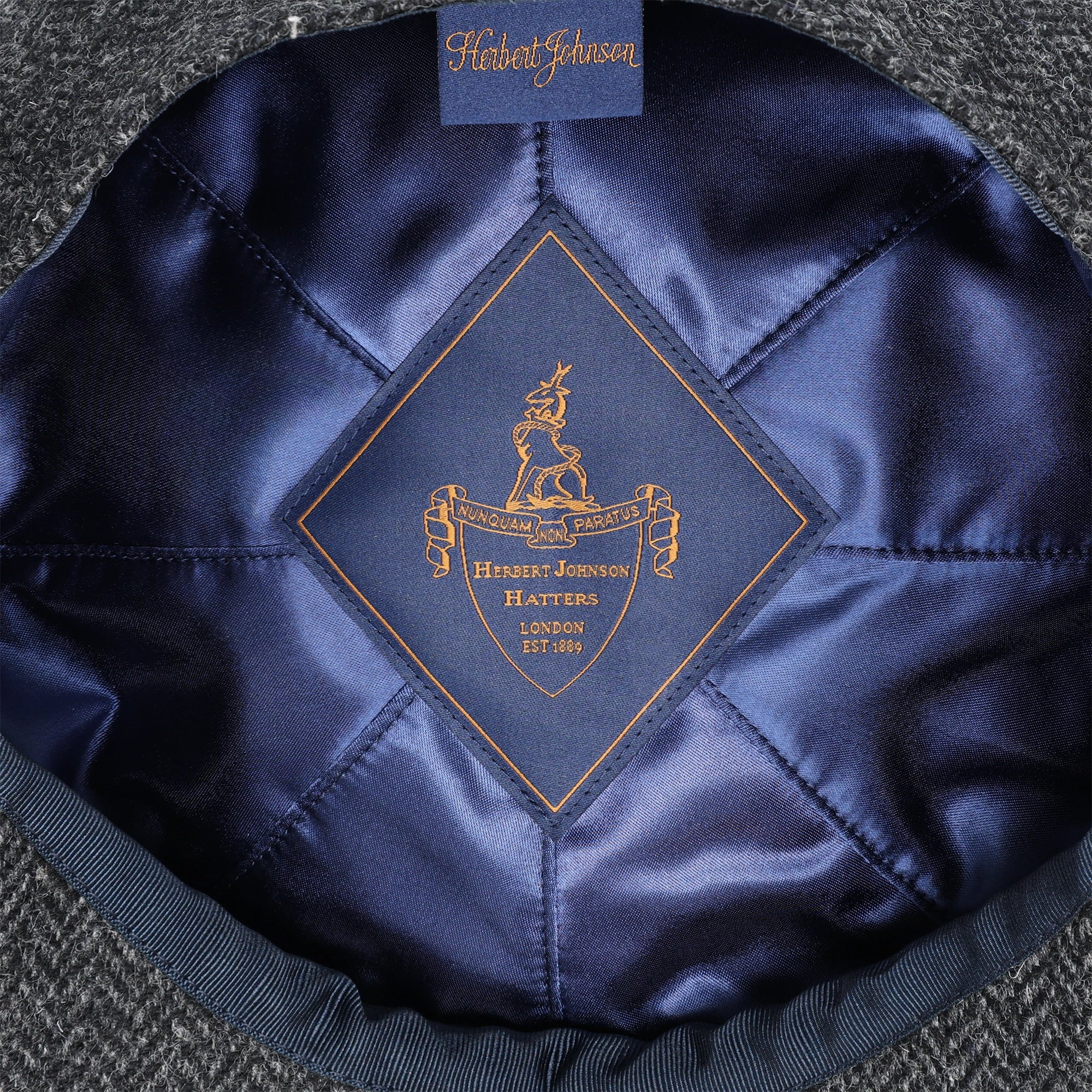 Baker Boy - Navy Herringbone - Swaine Group Ltd