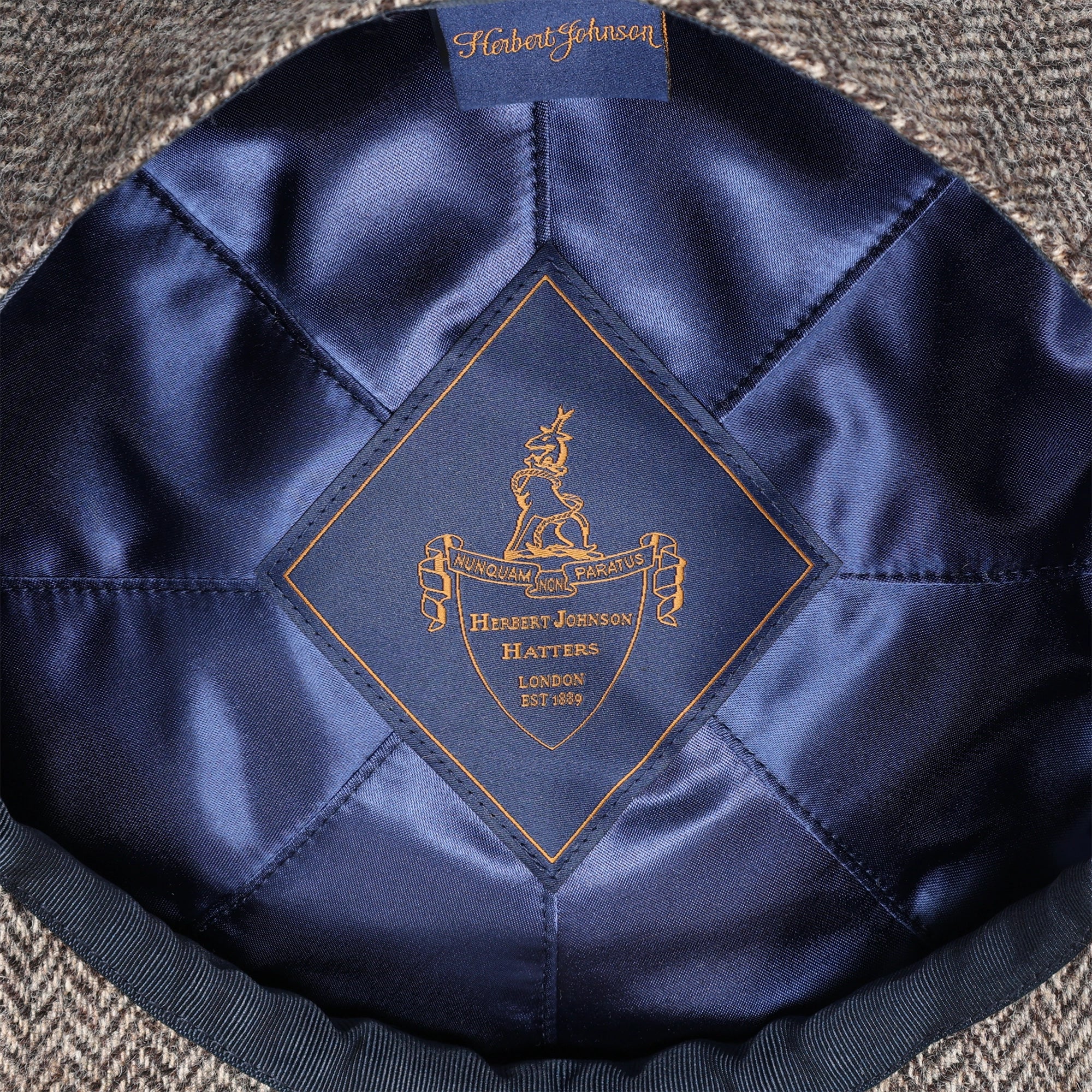 Baker Boy - Dark Grey Herringbone - Swaine Group Ltd